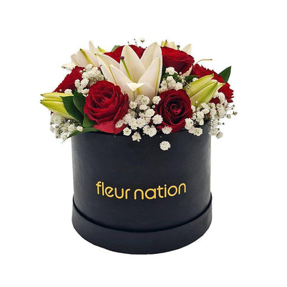 Standard Black Hat Box - Red Roses with Lilies - Fleur Nation - flowers, chocolates, cakes and gifts same day delivery in Dubai